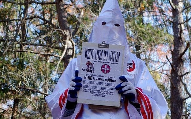 A member of the Ku Klux Klan who says his name is Gary Munker poses for a photo during an interview with AFP in Hampton Bays, New York on November 22, 2016. (AFP/William Edwards) A member of the Ku Klux Klan who says his name is Gary Munker poses for a photo during an interview with AFP in Hampton Bays, New York on November 22, 2016. (AFP/William Edwards)