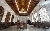 A man walks inside a hall at the al-Qarawyin Library in the Moroccan city of Fez on November 21, 2016.
(AFP PHOTO / FADEL SENNA)