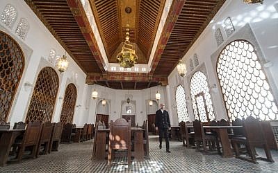 A man walks inside a hall at the al-Qarawyin Library in the Moroccan city of Fez on November 21, 2016.
(AFP PHOTO / FADEL SENNA)