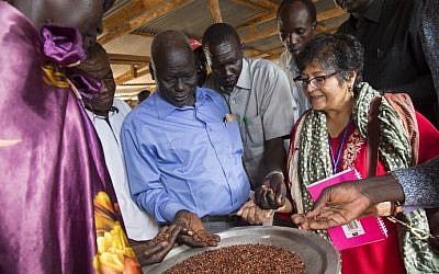Yasime Sooka, a member of the UN Commission on Human Rights, is shown a common staple of Sorghum by community leaders of the UN Protection of Civilians site in Juba, South Sudan, on November 28, 2016. (AFP PHOTO/ALBERT GONZALEZ FARRAN) Yasime Sooka, a member of the UN Commission on Human Rights, is shown a common staple of Sorghum by community leaders of the UN Protection of Civilians site in Juba, South Sudan, on November 28, 2016. (AFP PHOTO/ALBERT GONZALEZ FARRAN)