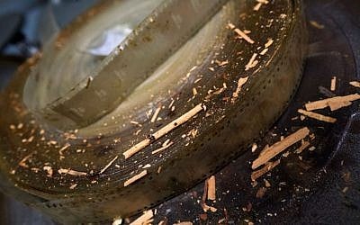 A picture shows a section of an old damaged film roll of the movie 'The City Without Jews' at Filmarchiv Austria in Laxenburg on November 15, 2016. (AFP PHOTO / JOE KLAMAR)