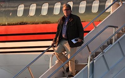 Steve Bannon gets off the plane with US President-elect Donald Trump arrives at Cincinnati/Northern Kentucky International Airport in Hebron, Kentucky, for the start of the "USA Thank You Tour" at the US Bank Arena in Cincinnati, Ohio, December 1, 2016. (AFP PHOTO/TIMOTHY A. CLARY)