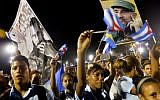 Cubans pay homage to the late leader Fidel Castro during the last ceremony before his burial in Santiago de Cuba, the cradle of his revolution, on December 3, 2016. (AFP/Pedro Pardo)