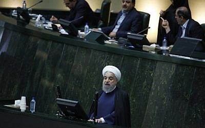 Iran's President Hassan Rouhani presents to the parliament his budget for 2017-2018, on December 4, 2016, in Tehran. (AFP Photo/Atta Kenare)