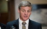 New Zealand Deputy Prime Minister Bill English speaks to the media during a press conference at Parliament in Wellington, December 5, 2016. (AFP/Marty Melville)