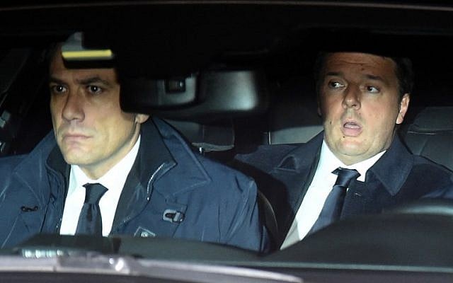 Italian Prime Minister Matteo Renzi (R) arrives by car at the Quirinale presidential palace to meet Italy's President Sergio Mattarella and formally offer his resignation following a crushing referendum defeat, on December 5, 2016 in Rome. (AFP PHOTO / Alberto PIZZOLI) Italian Prime Minister Matteo Renzi (R) arrives by car at the Quirinale presidential palace to meet Italy's President Sergio Mattarella and formally offer his resignation following a crushing referendum defeat, on December 5, 2016 in Rome. (AFP PHOTO / Alberto PIZZOLI)