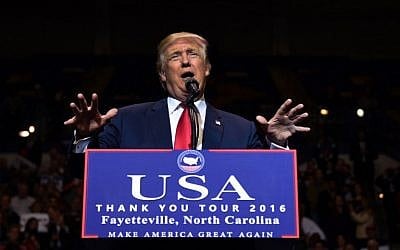US President-elect Donald Trump speaks at the Crown Coliseum in Fayetteville, North Carolina on December 6, 2016. (AFP/TIMOTHY A. CLARY)