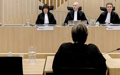 (FromL) Judges Elianne van Rens, Henry Stone House and Sijbrand Wreath talk before rendering the verdict in the criminal case against populist Dutch MP Geert Wilders of the Party for Freedom (PVV), at Schiphol, Badhoevedorp, in the Netherlands, on December 9, 2016. (AFP PHOTO / ANP / Sander Koning / Netherlands OUT)