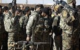 Fighters from the Kurdish-Arab alliance, known as the Syrian Democratic Forces, prepare for an assault on the Islamic State (IS) bastion of Raqqa on December 10, 2016. (DELIL SOULEIMAN / AFP)



 
A US-backed alliance of Arab and Kurdish fighters announced "phase two" of its campaign for the Islamic State group's Syrian bastion of Raqa.  / AFP PHOTO / DELIL SOULEIMAN