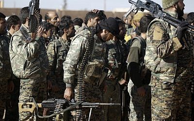 Fighters from the Kurdish-Arab alliance, known as the Syrian Democratic Forces, prepare for an assault on the Islamic State (IS) bastion of Raqqa on December 10, 2016. (DELIL SOULEIMAN / AFP)



 
A US-backed alliance of Arab and Kurdish fighters announced "phase two" of its campaign for the Islamic State group's Syrian bastion of Raqa.  / AFP PHOTO / DELIL SOULEIMAN