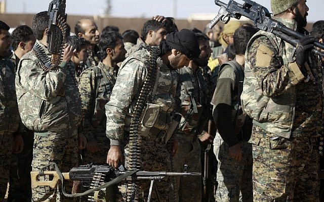 Fighters from the Kurdish-Arab alliance, known as the Syrian Democratic Forces, prepare for an assault on the Islamic State (IS) bastion of Raqqa on December 10, 2016. (DELIL SOULEIMAN / AFP)
A US-backed alliance of Arab and Kurdish fighters announced "phase two" of its campaign for the Islamic State group's Syrian bastion of Raqa. / AFP PHOTO / DELIL SOULEIMAN Fighters from the Kurdish-Arab alliance, known as the Syrian Democratic Forces, prepare for an assault on the Islamic State (IS) bastion of Raqqa on December 10, 2016. (DELIL SOULEIMAN / AFP)
A US-backed alliance of Arab and Kurdish fighters announced "phase two" of its campaign for the Islamic State group's Syrian bastion of Raqa. / AFP PHOTO / DELIL SOULEIMAN