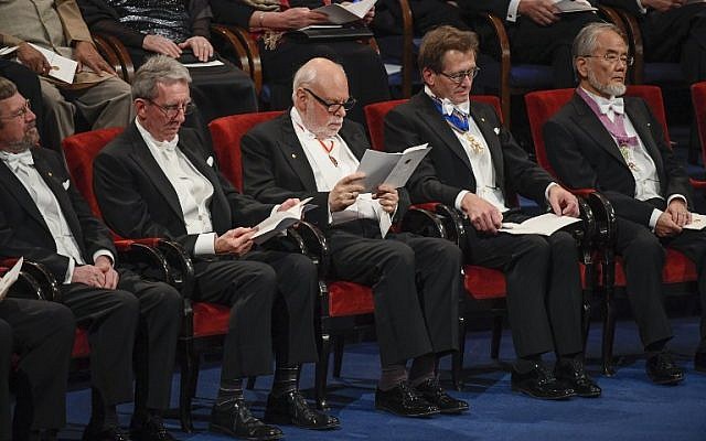 2016 Nobel laureates (from left) Michael Kosterlitz, physics, Jean-Pierre Sauvage, Sir J. Fraser Stoddart, Bernard L. Feringa, all chemistry, and Yoshinori Ohsumi, physiology or medicine, attend the 2016 Nobel Prize award ceremony at the Stockholm Concert Hall on December 10, 2016. (AFP PHOTO/TT NEWS AGENCY/JESSICA GOW)