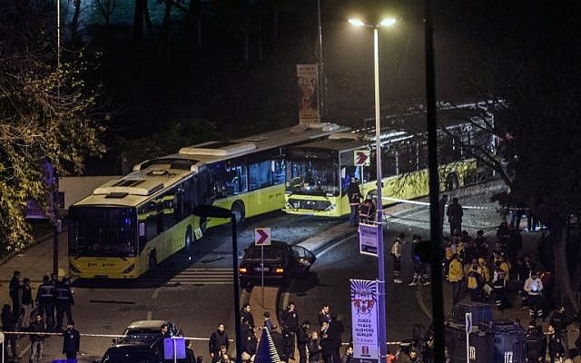 Turkish emergency workers, police officers and forensic work on the site where a car bomb exploded near the stadium of football club Besiktas in central Istanbul on December 10, 2016. (AFP PHOTO/OZAN KOSE) Turkish emergency workers, police officers and forensic work on the site where a car bomb exploded near the stadium of football club Besiktas in central Istanbul on December 10, 2016. (AFP PHOTO/OZAN KOSE)