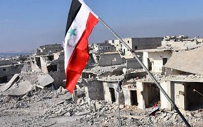 A general view shows destroyed buildings in Aleppo's Sheikh Saeed district, on December 12, 2016, after Syrian pro-government forces retook the area from rebel fighters. (AFP PHOTO / GEORGE OURFALIAN)