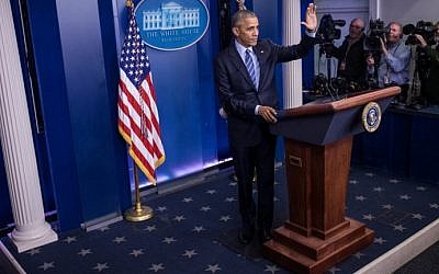 US President Barack Obama waves as he wraps up a year-end press conference in the Brady Press Briefing Room of the White House in Washington, DC, December 16, 2016. (AFP/Zach Gibson) US President Barack Obama waves as he wraps up a year-end press conference in the Brady Press Briefing Room of the White House in Washington, DC, December 16, 2016. (AFP/Zach Gibson)
