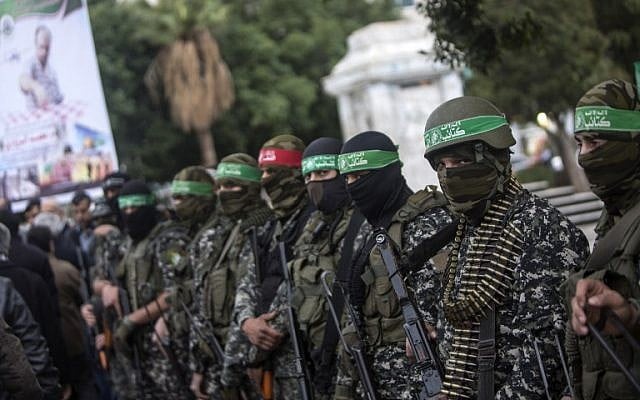 Members of the Izz ad Din al-Qassam Brigades, Hamass military wing, take part in a ceremony, on December 18, 2016, in Gaza City in the memory of one of their leaders, Mohamed Zaouari, who was murdered in Tunisia. (AFP/Mahmud Hams) Members of the Izz ad Din al-Qassam Brigades, Hamass military wing, take part in a ceremony, on December 18, 2016, in Gaza City in the memory of one of their leaders, Mohamed Zaouari, who was murdered in Tunisia. (AFP/Mahmud Hams)