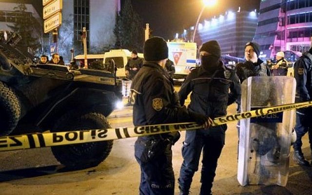 Turkish soldiers and police stand guard near the Cagdas Sanatlar Merkezi, a major art exhibition hall, where Andrey Karlov, the Russian ambassador to Ankara, was shot dead on December 19, 2016, in Ankara. (AFP PHOTO / ADEM ALTAN) Turkish soldiers and police stand guard near the Cagdas Sanatlar Merkezi, a major art exhibition hall, where Andrey Karlov, the Russian ambassador to Ankara, was shot dead on December 19, 2016, in Ankara. (AFP PHOTO / ADEM ALTAN)