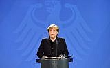 The day after a terrorist attack in which a speeding truck killed 12 people at a Berlin Christmas market German Chancellor Angela Merkel speaks during a press conference in Berlin, on December 20, 2016. (AFP/John MACDOUGALL)