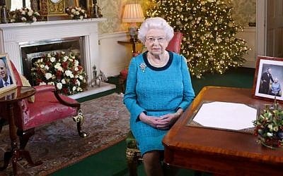 Britain's Queen Elizabeth II sits at a desk in the Regency Room in Buckingham Palace in London, after recording her Christmas Day broadcast to the Commonwealth on December 25, 2016. (AFP Photo/Pool/Yui Mok) Britain's Queen Elizabeth II sits at a desk in the Regency Room in Buckingham Palace in London, after recording her Christmas Day broadcast to the Commonwealth on December 25, 2016. (AFP Photo/Pool/Yui Mok)