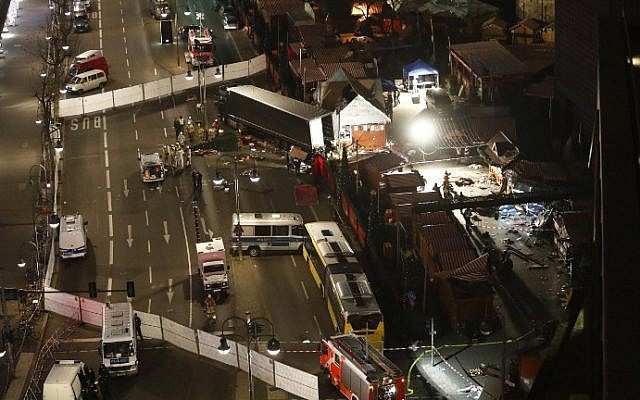 Authorities inspect a truck that sped into a Christmas market in Berlin, on December 19, 2016. (AFP Photo/Odd Andersen) Authorities inspect a truck that sped into a Christmas market in Berlin, on December 19, 2016. (AFP Photo/Odd Andersen)