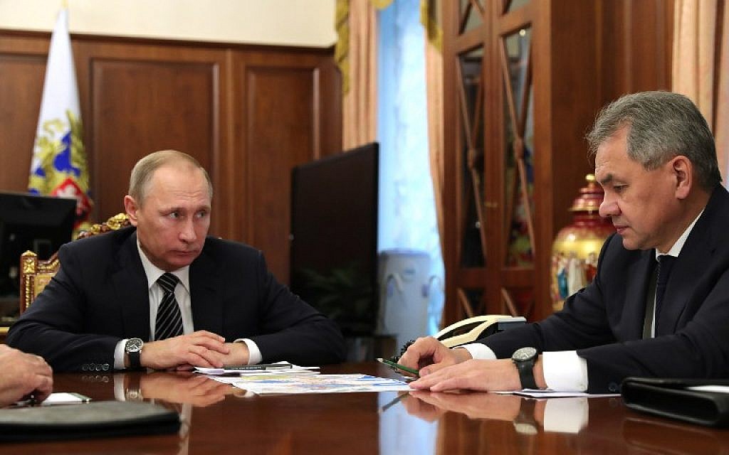 Russian President Vladimir Putin (left) speaks with Defense Minister Sergey Shoigu during a meeting at the Kremlin in Moscow on December 29, 2016. (AFP PHOTO/Sputnik/Michael Klimentyev) Russian President Vladimir Putin (left) speaks with Defense Minister Sergey Shoigu during a meeting at the Kremlin in Moscow on December 29, 2016. (AFP PHOTO/Sputnik/Michael Klimentyev)
