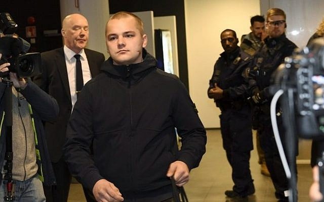 Picture taken on December 21, 2016 shows Jesse Torniainen (C), a member of the Finnish neo-Nazi group Finnish Resistance Movement (FRM), during his trial at the District Court in Helsinki, Finland. (AFP/Lehtikuva/Vesa Moilanen) Picture taken on December 21, 2016 shows Jesse Torniainen (C), a member of the Finnish neo-Nazi group Finnish Resistance Movement (FRM), during his trial at the District Court in Helsinki, Finland. (AFP/Lehtikuva/Vesa Moilanen)