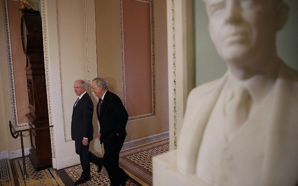 Sen. Jeff Sessions, left, and Senate Majority Leader Mitch McConnell depart from a meeting on Capitol Hill, November 30, 2016 in Washington, DC. (Mark Wilson/Getty Images/AFP)