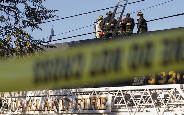 Firefighters investigate the scene of a overnight fire that claimed the lives of at least nine people during a warehouse party in the Fruitvale neighborhood on December 3, 2016 in Oakland, California. (Elijah Nouvelage/Getty Images/AFP) Firefighters investigate the scene of a overnight fire that claimed the lives of at least nine people during a warehouse party in the Fruitvale neighborhood on December 3, 2016 in Oakland, California. (Elijah Nouvelage/Getty Images/AFP)