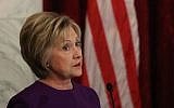 Former US Secretary of State, Hillary Clinton speaks during a portrait unveiling ceremony for outgoing Senate Minority Leader Harry Reid (D-NV), on Capitol Hill December 8, 2016 in Washington, DC.  (Mark Wilson/Getty Images/AFP)