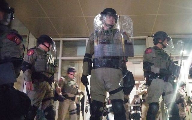 Riot Police secure the hall at Texas A&M University on Tuesday, December 6, 2016, where so-called alt-right leader, Richard Spencer, gave a talk. (Ricky Ben-David/Times of Israel)