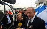 Prime Minister Benjamin Netanyahu speaks to reporters before departing for a two-day visit to Azerbaijan and Kazakhstan, December 13, 2016. (Times of Israel/Raphael Ahren)
