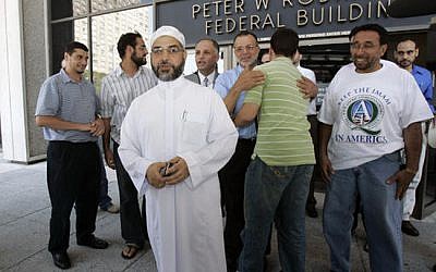 Imam Mohammad Qatanani, center left, and supporters leave the Peter W. Rodino Jr. Federal Building in Newark, NJ, on Sept. 4, 2008, after an immigration judge ruled that he could remain in the US. (AP Photo/Mike Derer,file) Imam Mohammad Qatanani, center left, and supporters leave the Peter W. Rodino Jr. Federal Building in Newark, NJ, on Sept. 4, 2008, after an immigration judge ruled that he could remain in the US. (AP Photo/Mike Derer,file)