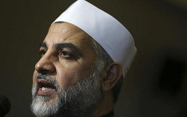 Imam Mohammad Qatanani answers a question as he joins a group of Muslim community leaders gathered in Piscataway, NJ to condemn terrorist attacks, on Nov. 17, 2015. (AP Photo/Mel Evans,file) Imam Mohammad Qatanani answers a question as he joins a group of Muslim community leaders gathered in Piscataway, NJ to condemn terrorist attacks, on Nov. 17, 2015. (AP Photo/Mel Evans,file)