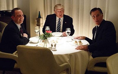 President-elect Donald Trump, center, eats dinner with Mitt Romney, right, and Trump Chief of Staff Reince Priebus at Jean-Georges restaurant, Tuesday, Nov. 29, 2016, in New York. (AP Photo/Evan Vucci)