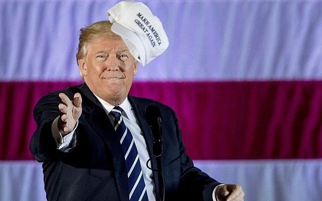 President-elect Donald Trump throws a hat into the audience while speaking at a rally in a DOW Chemical Hanger at Baton Rouge Metropolitan Airport, Friday, Dec. 9, 2016, in Baton Rouge, La. (AP Photo/Andrew Harnik) President-elect Donald Trump throws a hat into the audience while speaking at a rally in a DOW Chemical Hanger at Baton Rouge Metropolitan Airport, Friday, Dec. 9, 2016, in Baton Rouge, La. (AP Photo/Andrew Harnik)