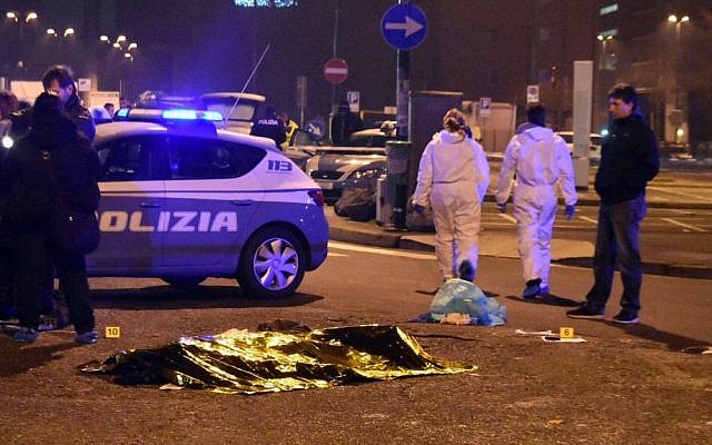 The body of suspected Berlin attacker Ani Amri is covered with a blanket after a shootout near a train station in Milan's Sesto San Giovanni neighborhood, Italy, early Friday, December 23, 2016. (AP Photo/Daniele Bennati) The body of suspected Berlin attacker Ani Amri is covered with a blanket after a shootout near a train station in Milan's Sesto San Giovanni neighborhood, Italy, early Friday, December 23, 2016. (AP Photo/Daniele Bennati)