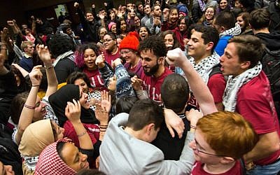 Northwestern University students celebrating after the student Senate passed a divestment resolution against Israel, February 2015. (Courtesy of Nathan Richards/The Daily Northwestern)
