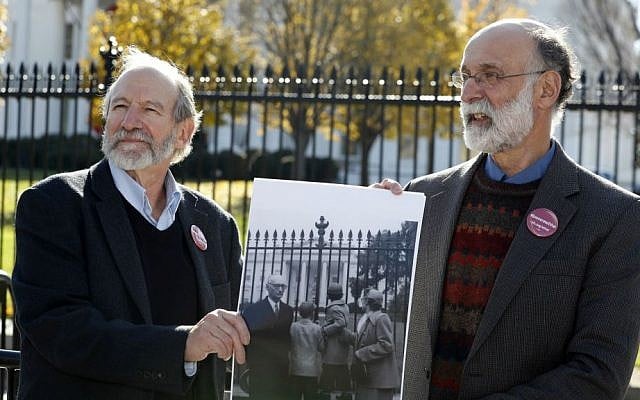 Michael, left, and Robert Meeropol, the sons of Ethel Rosenberg, pose next to an old photograph of them, before they attempt to deliver a letter to President Barack Obama in an effort to obtain an exoneration for their mother, in front of the White House, Thursday, Dec. 1, 2016. (AP Photo/Alex Brandon) Michael, left, and Robert Meeropol, the sons of Ethel Rosenberg, pose next to an old photograph of them, before they attempt to deliver a letter to President Barack Obama in an effort to obtain an exoneration for their mother, in front of the White House, Thursday, Dec. 1, 2016. (AP Photo/Alex Brandon)
