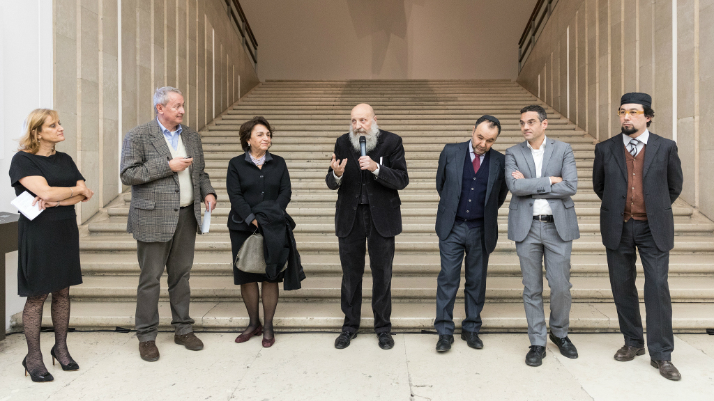 Designer Elio Carmi (center), speaking at the inauguration of the Triennale exhibition. Also, from left to right, the president of the Union of Italian Jewish Communities Noemi Di Segni, president of the Triennale Design Museum Arturo Dell’Acqua Bellavitis, Casale Monferrato mayor Titti Palazzetti, (designer Elio Carmi), Rabbi Roberto Della Rocca, Father Walter Magnoni, Imam Yahya Pallavicini. (Credit Gianluca Di Ioia/ La Triennale di Milano) Designer Elio Carmi (center), speaking at the inauguration of the Triennale exhibition. Also, from left to right, the president of the Union of Italian Jewish Communities Noemi Di Segni, president of the Triennale Design Museum Arturo Dell’Acqua Bellavitis, Casale Monferrato mayor Titti Palazzetti, (designer Elio Carmi), Rabbi Roberto Della Rocca, Father Walter Magnoni, Imam Yahya Pallavicini. (Credit Gianluca Di Ioia/ La Triennale di Milano)