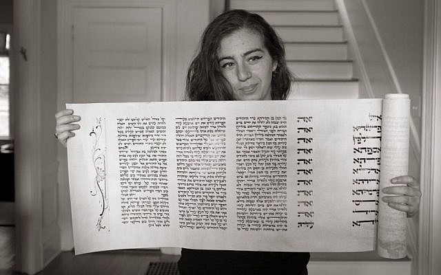 Rachel Jackson holds her completed Megillat Esther. (Courtesy)