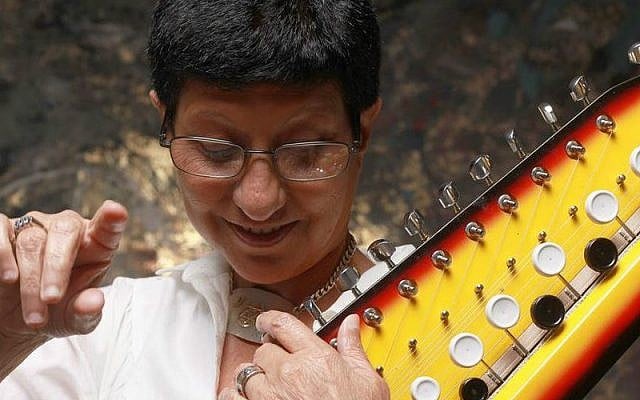 Beloved Israeli singer Ahuva Ozeri, here with her favorite instrument, the Bulbul tarang, died Tuesday, December 13, 2016 (Courtesy Ilan Besor) Beloved Israeli singer Ahuva Ozeri, here with her favorite instrument, the Bulbul tarang, died Tuesday, December 13, 2016 (Courtesy Ilan Besor)