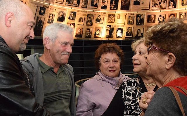 First cousins who thought their entire families had died in the Holocaust uniting at Yad Vashem, Dec. 13, 2016. (Courtesy of Yad Vashem) 