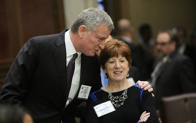 New York City Mayor Bill de Blasio, left, and Albany Mayor Katherine M. Sheehan talk as members of New York state's Electoral College meet before voting for president in the Senate Chamber of the Capitol in Albany, New York, Monday, Dec. 19, 2016. (AP Photo/Hans Pennink via AP, Pool)