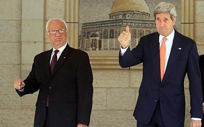 US Secretary of State John Kerry (R) seen with chief Palestinian negotiator Saeb Erekat at the Palestinian Presidential compound in Ramallah on July 23, 2014. (Issam Rimawi/Flash90)