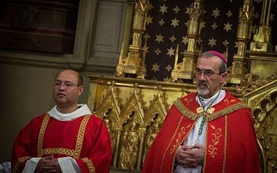 Pierbattista Pizzaballa (r) during the ceremony honoring his entry as Apostolic Administrator at the Latin Patriarchate Church in Jerusalem's Old City, on September 21, 2016. (Hadas Parush/Flash90)