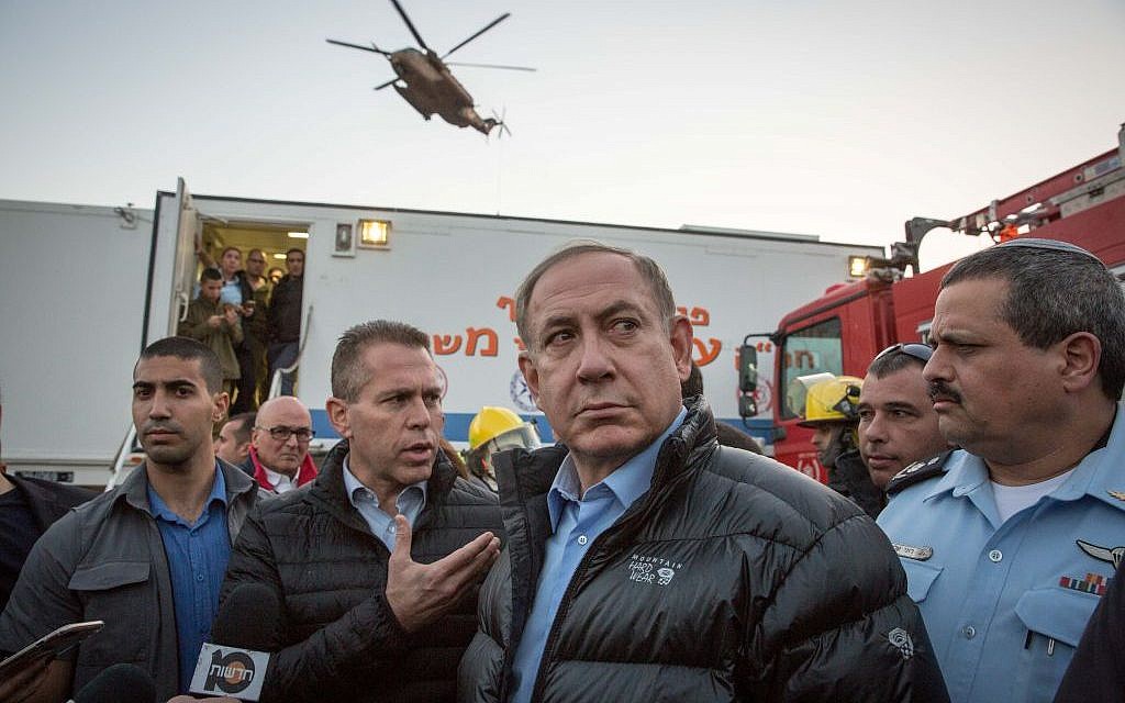 Prime Minister Benjamin Netanyahu visits scene of forest fires that broke out in Zichron Yaakov in northern Israel, on November 23, 2016. (Emil Salman/Pool) Prime Minister Benjamin Netanyahu visits scene of forest fires that broke out in Zichron Yaakov in northern Israel, on November 23, 2016. (Emil Salman/Pool)