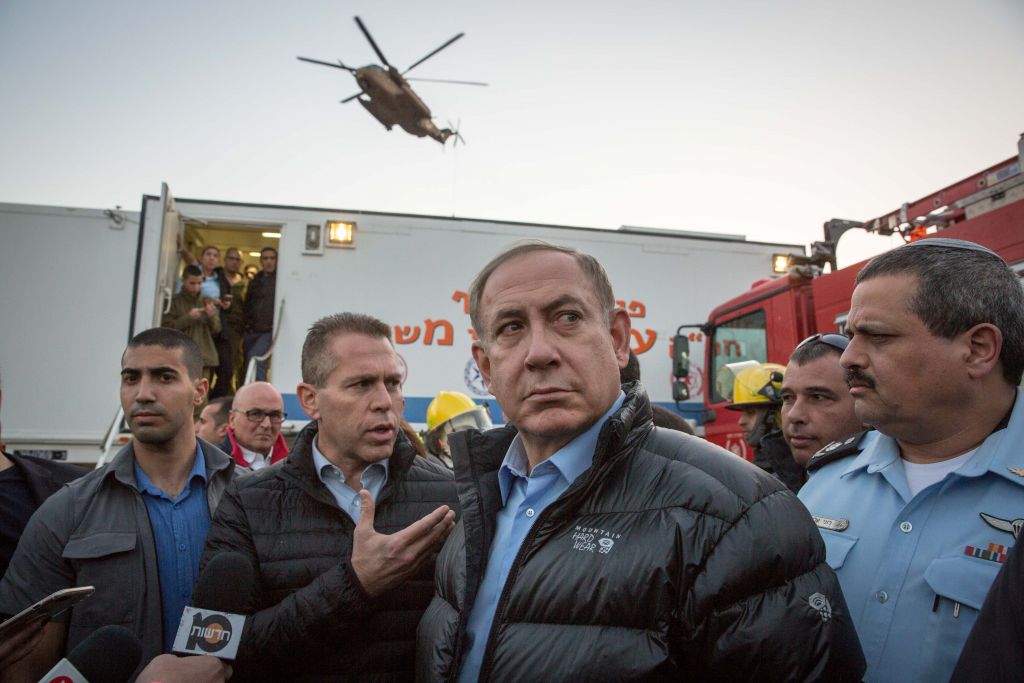 Prime Minister Benjamin Netanyahu visits scene of forest fires that broke out in Zichron Yaakov in northern Israel, on November 23, 2016. (Emil Salman/Pool) Prime Minister Benjamin Netanyahu visits scene of forest fires that broke out in Zichron Yaakov in northern Israel, on November 23, 2016. (Emil Salman/Pool)