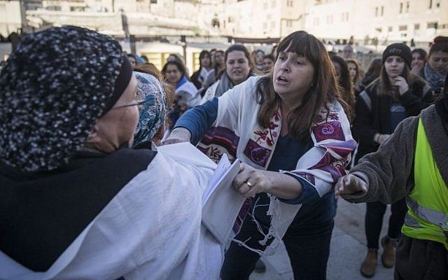 Ultra-Orthodox women protest against the Women of the Wall movement during a prayer service at the Western Wall on December 1, 2016. (Hadas Parush/Flash90)