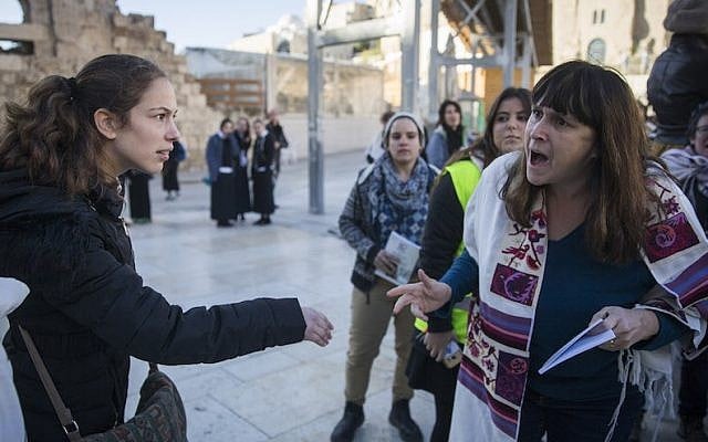 Protesters confront members of Women of the Wall at the Western Wall in Jerusalem, Dec. 1, 2016. (Hadas Parush/Flash90) Protesters confront members of Women of the Wall at the Western Wall in Jerusalem, Dec. 1, 2016. (Hadas Parush/Flash90)