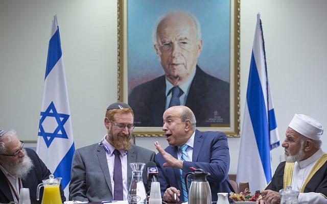 Likud MK Yehudah Glick and Zionist Union MK Zouheir Bahloul hold an emergency meeting on the muezzin law, a bill which intends to ban loudspeakers at mosques, in the Israeli parliament on December 05, 2016. (Miriam Alster/FLASH90) Likud MK Yehudah Glick and Zionist Union MK Zouheir Bahloul hold an emergency meeting on the muezzin law, a bill which intends to ban loudspeakers at mosques, in the Israeli parliament on December 05, 2016. (Miriam Alster/FLASH90)